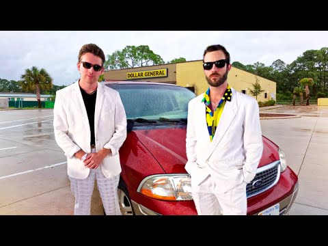 Two brits dress like GTA characters and drive into Hurricane Ian (How NOT to travel America #7)