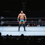 The Unraveling: Wrestling Star’s Hopes Clash with Chaos in the Stands